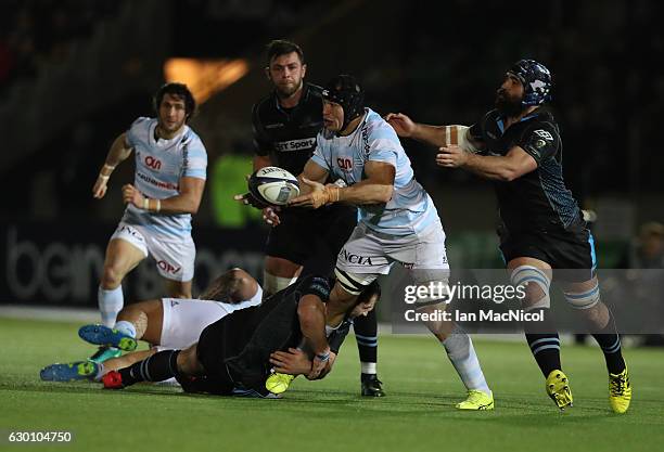 Wenceslas Lauret of Racing 92 is tackled by Fraser Brown of Glasgow during the European Rugby Champions Cup match between Glasgow Warriors and Racing...