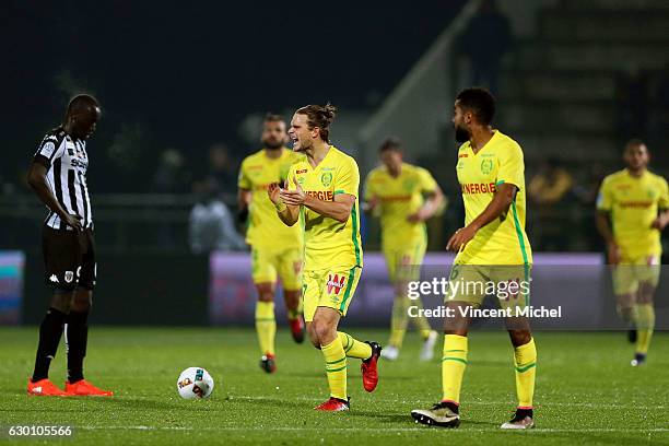 Guillaume Gillet of Nantes celebrates after scoring the first goal during the French Ligue 1 match between Angers and Nantes on December 16, 2016 in...