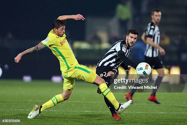 Pablo Martinez of Angers and Emiliano Sala of Nantes during the French Ligue 1 match between Angers and Nantes on December 16, 2016 in Angers, France.