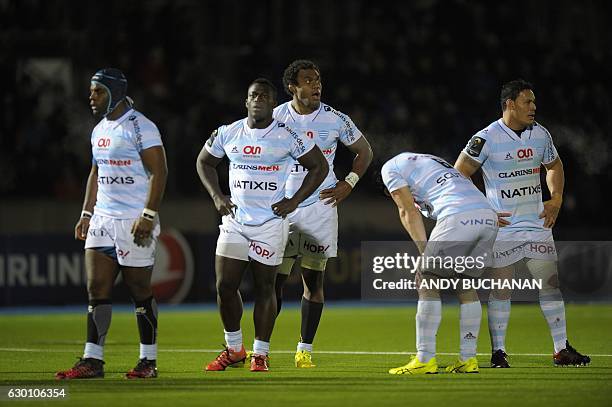 Racing 92 players react to their situation during the European Champions Cup pool 1 rugby union match between Glasgow Warriors and Racing 92 at...