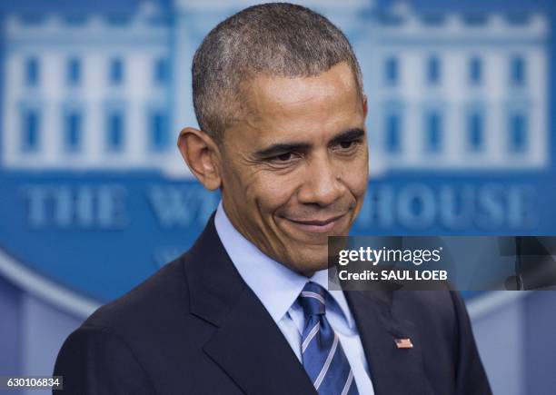 President Barack Obama holds a year-end press conference in the Brady Press Briefing Room of the White House in Washington, DC, December 16, 2016....