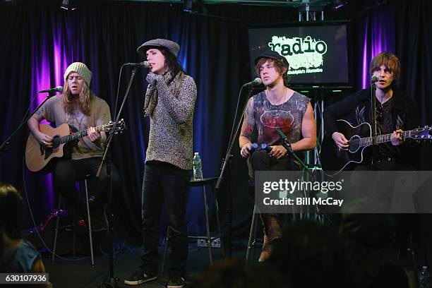 Adam Slack, Luke Spiller, Gethin Davies and Jed Elliott of The Struts perform at the Radio 104.5 Performance Theater December 16, 2016 in Bala...