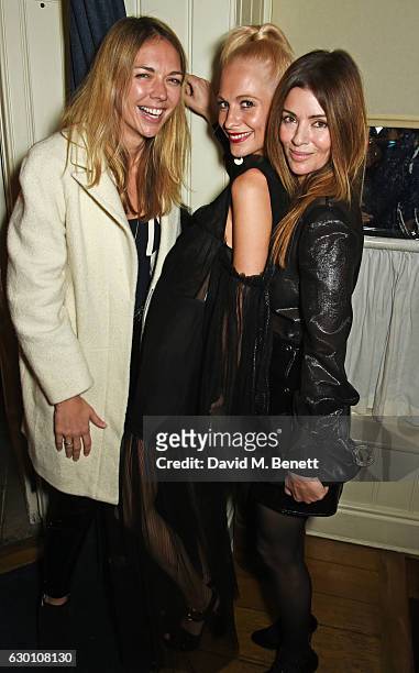 Tori Cook, Poppy Delevingne and Sara Macdonald attend the LOVE Christmas Party hosted by Katie Grand and Poppy Delevingne at George on December 16,...