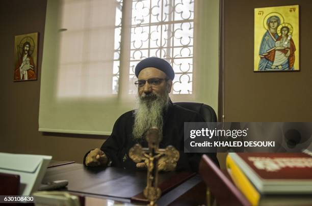 Egyptian priest and Coptic Orthodox Church spokesperson Boulos Halim gives an interview with AFP at his office in the Cathedral in Cairo's Abassiya...