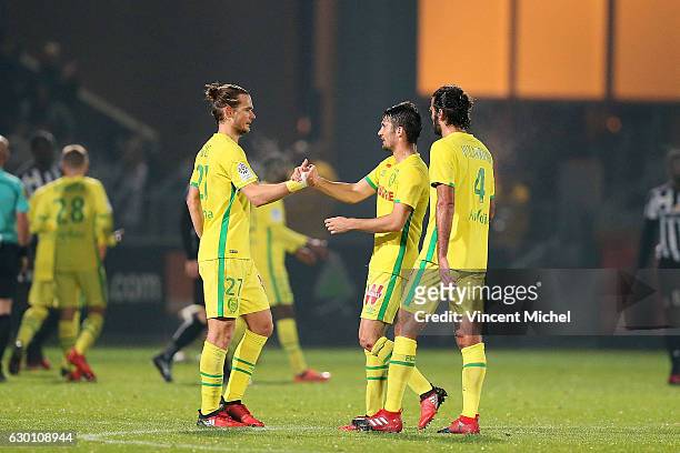Guillaume Gillet of Nantes and Leo Dubois of Nantes jubilates at the end of the match during the French Ligue 1 match between Angers and Nantes on...