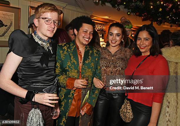 Ed Marler, Matthew Josephs, Isamaya Ffrench and guest attend the LOVE Christmas Party hosted by Katie Grand and Poppy Delevingne at George on...