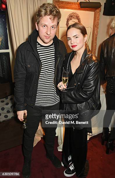 Bosse Mhyr and guest attend the LOVE Christmas Party hosted by Katie Grand and Poppy Delevingne at George on December 16, 2016 in London, England.