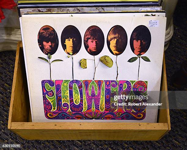 November 18, 2016: A Rolling Stones LP album titled 'Flowers', released in 1967, is among the items for sale in an antique shop in Durango, Colorado.