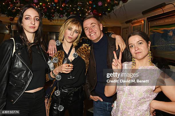 Tish Weinstock, Edie Campbell, Alasdair McLellan and Madeleine Ostlie attend the LOVE Christmas Party hosted by Katie Grand and Poppy Delevingne at...
