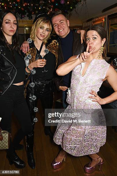 Tish Weinstock, Edie Campbell, Alasdair McLellan and Madeleine Ostlie attend the LOVE Christmas Party hosted by Katie Grand and Poppy Delevingne at...