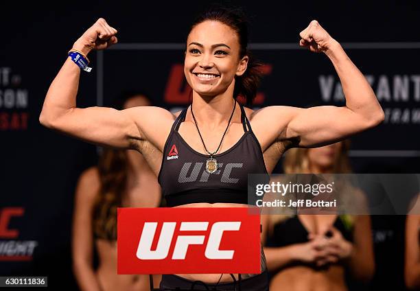 Michelle Waterson poses on the scale during the UFC Fight Night weigh-in inside the Golden 1 Center Arena on December 16, 2016 in Sacramento,...