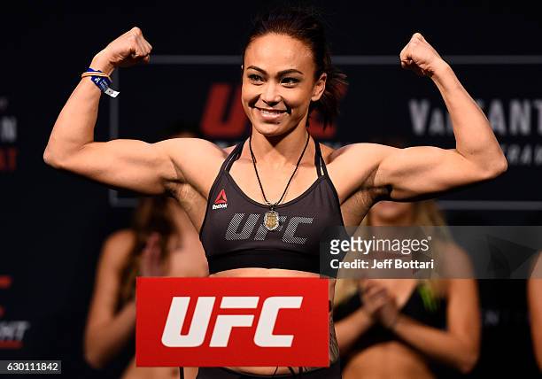 Michelle Waterson poses on the scale during the UFC Fight Night weigh-in inside the Golden 1 Center Arena on December 16, 2016 in Sacramento,...