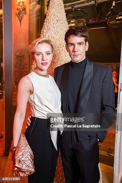 Scarlett Johansson and Romain Dauriac attend the Yummy Pop Grand Opening Party at Theatre du Gymnase on December 16, 2016 in Paris, France.