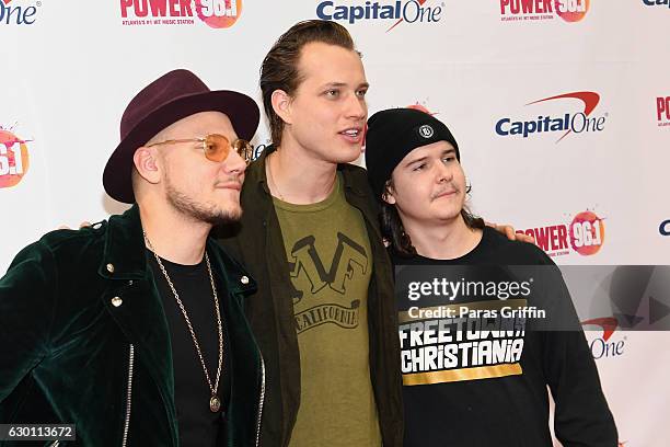 Mark Falgren, Magnus Larsson, and Lukas Forchhammer of Lukas Graham attend Power 96.1's Jingle Ball 2016 at Philips Arena on December 16, 2016 in...