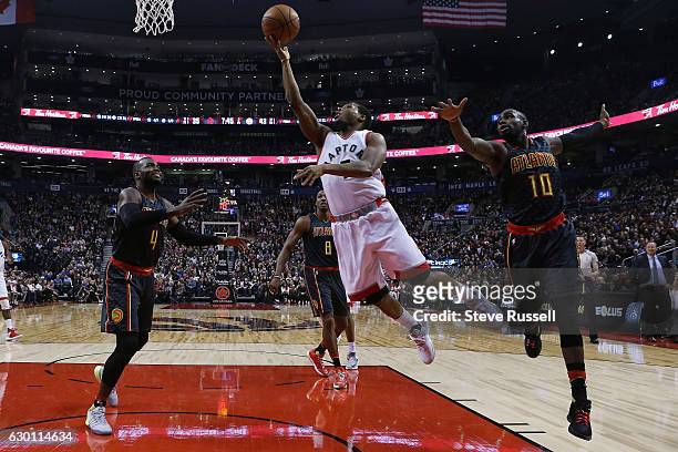 Toronto Raptors guard Kyle Lowry goes to the basket as the Toronto Raptors play the Atlanta Hawks at the Air Canada Centre in Toronto. December 16,...