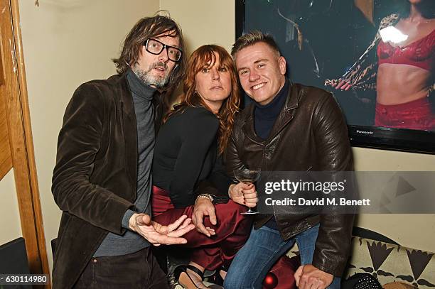 Jarvis Cocker, Kim Sion and Alasdair McLellan attend the LOVE Christmas Party hosted by Katie Grand and Poppy Delevingne at George on December 16,...