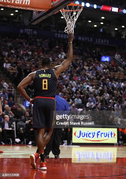 Atlanta Hawks center Dwight Howard relaxes during a break in play as the Toronto Raptors lose to the Atlanta Hawks 125-121 at the Air Canada Centre...