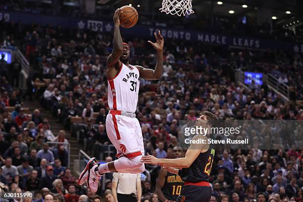 Toronto Raptors forward Terrence Ross lays the ball in in front of Atlanta Hawks guard Kyle Korver as the Toronto Raptors lose to the Atlanta Hawks...