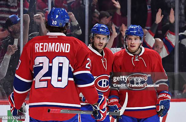 Brian Flynn of the Montreal Canadiens celebrates after scoring a goal against the San Jose Sharks in the NHL game at the Bell Centre on December 16,...