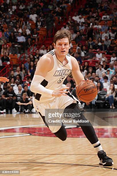 Luke Babbitt of the Miami Heat drives to the basket during a game against the LA Clippers on December 16, 2016 at American Airlines Arena in Miami,...