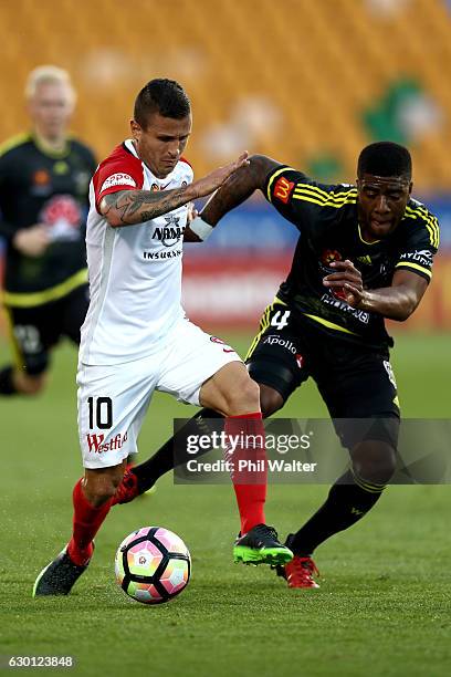 Nicolas Martinez of Western Sydney and Rolieny Bonevacia of Wellington compete for the ball during the round 11 A-League match between Wellington and...