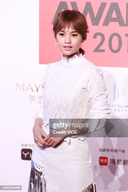 Singer and actress Rainie Yang arrives at the red carpet of 2016 ELLE Style Awards ceremony on December 16, 2016 in Shanghai, China.