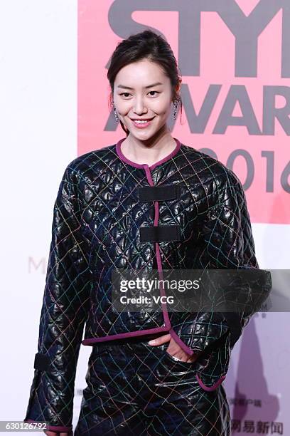 Model Liu Wen arrives at the red carpet of 2016 ELLE Style Awards ceremony on December 16, 2016 in Shanghai, China.