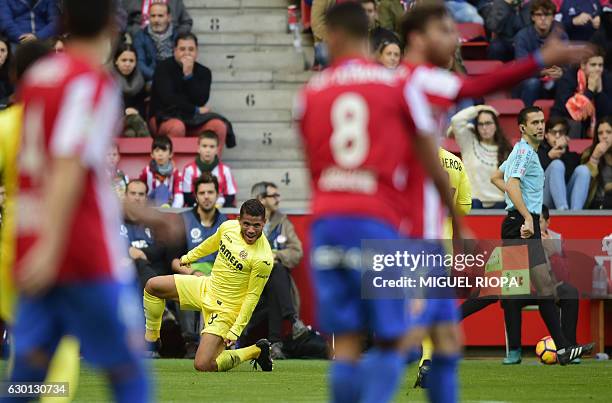 Villarreal's Mexican forward Jonathan dos Santos celebrates after scoring a goal during the Spanish league football match Real Sporting de Gijon vs...