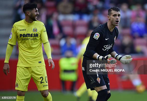 Sporting Gijon's goalkeeper Ivan Cuellar gestures after a second goal scored by Villarreal's Italian forward Nicola Sansone during the Spanish league...