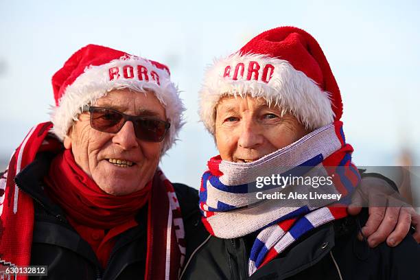 Fans get in the festive mood with Christmas hats prior to the Premier League match between Middlesbrough and Swansea City at Riverside Stadium on...