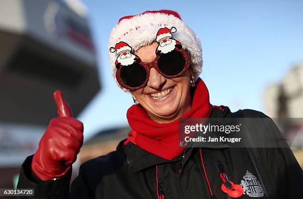 Fan in festive attire looks on ahead of the Premier League match between Sunderland and Watford at Stadium of Light on December 17, 2016 in...