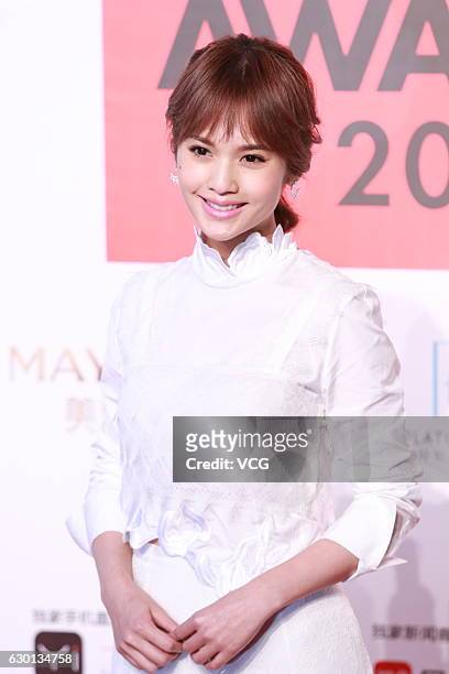 Singer and actress Rainie Yang arrives at the red carpet of 2016 ELLE Style Awards ceremony on December 16, 2016 in Shanghai, China.