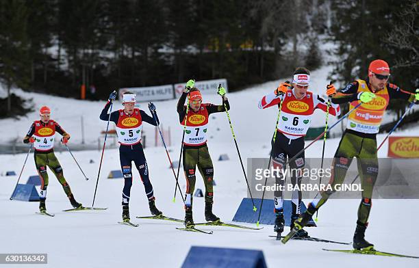 Vinzenz Geiger of Germany, Espen Andersen of Norway, Fabian Riessle of Germany, David Pommer of Austria, Johannes Rydzek compete at the Nordic...