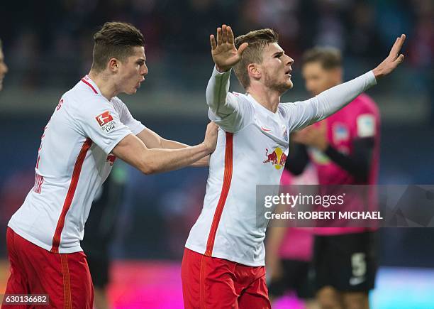 Leipzig´s striker Timo Werner celebrates after scoring with his team-mates during the German first division Bundesliga football match between RB...