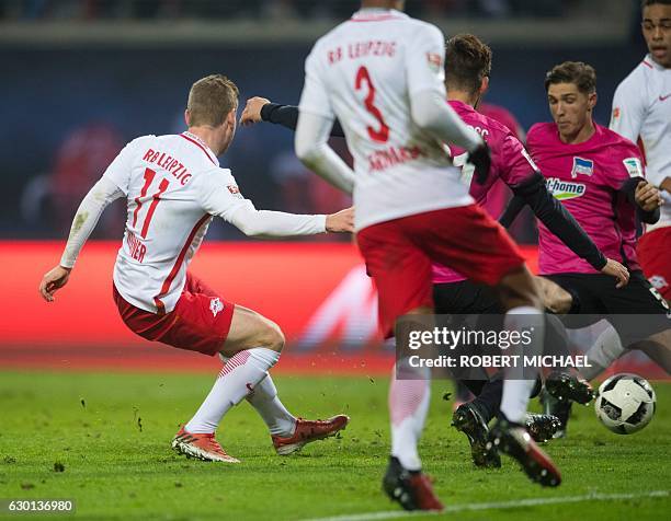 Leipzig´s striker Timo Werner scores during the German first division Bundesliga football match between RB Leipzig and Hertha BSC Berlin in Leipzig,...