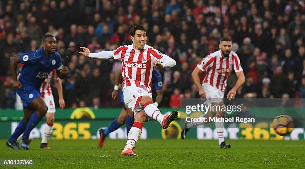 Bojan Krkic of Stoke City scores his sides first goal from the penalty spot during the Premier League match between Stoke City and Leicester City at...