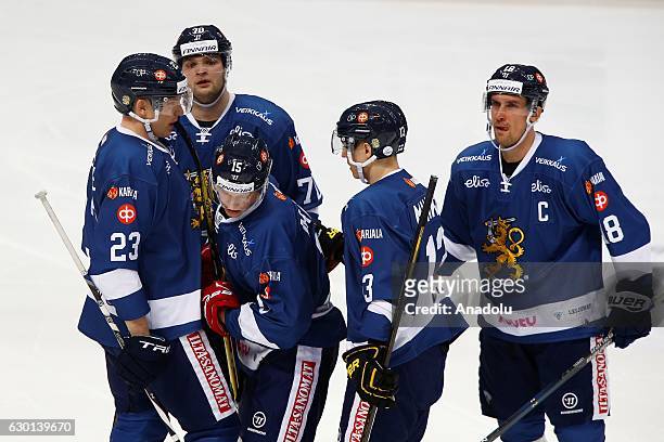 Players of Finland celebrates with his teammates after scoring during the Euro Hockey tour Channel One Cup match between Finland and Sweden at the...