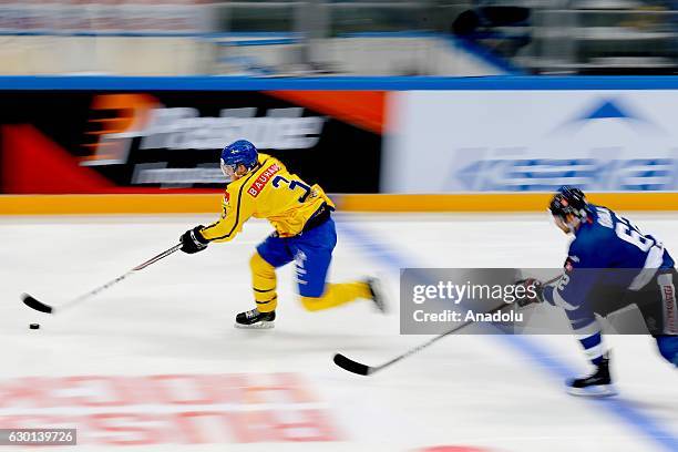 Player of Finland in action against player of Sweden during the Euro Hockey tour Channel One Cup match between Finland and Sweden at the VTB Ice...