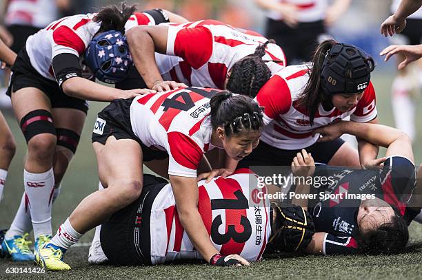 Makiko Tomita of Japan competes against Hong Kong during the Womens Rugby World Cup 2017 Qualifier match between Hong Kong and Japan on December 17,...