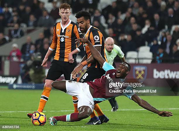 Michail Antonio of West Ham United is fouled in the penalty box by Tom Huddlestone of Hull City during the Premier League match between West Ham...