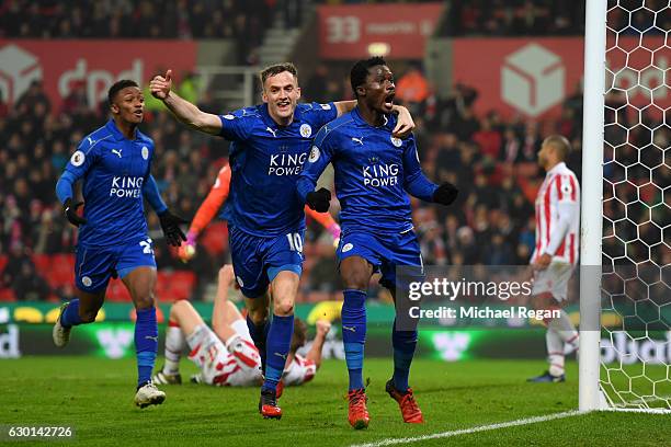 Daniel Amartey of Leicester City celebrates scoring his sides second goal with Andy King of Leicester City during the Premier League match between...