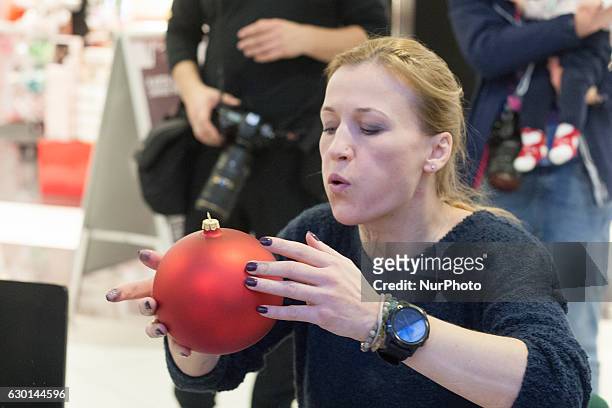 Multiple World and European champion in kick-boxing and boxing Iwona Guzowska takes part in the charity Christmas baubles painting in CH Klif...