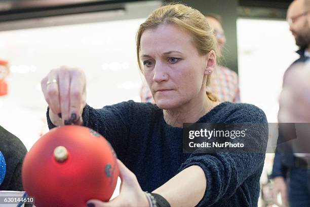 Multiple World and European champion in kick-boxing and boxing Iwona Guzowska takes part in the charity Christmas baubles painting in CH Klif...