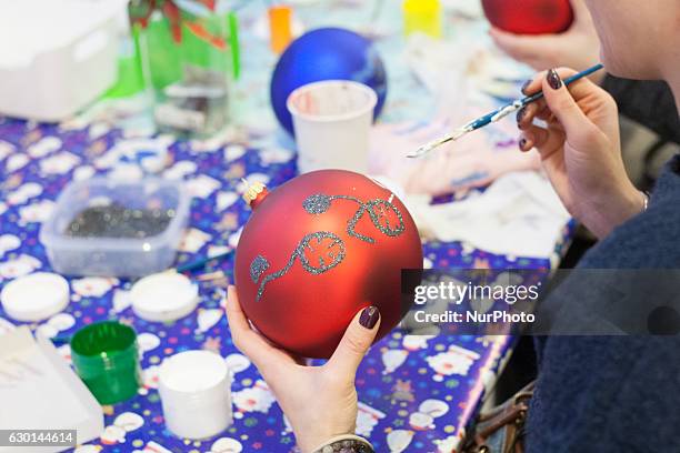 Multiple World and European champion in kick-boxing and boxing Iwona Guzowska takes part in the charity Christmas baubles painting in CH Klif...