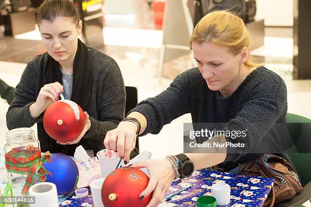 Multiple World and European champion in kick-boxing and boxing Iwona Guzowska takes part in the charity Christmas baubles painting in CH Klif...