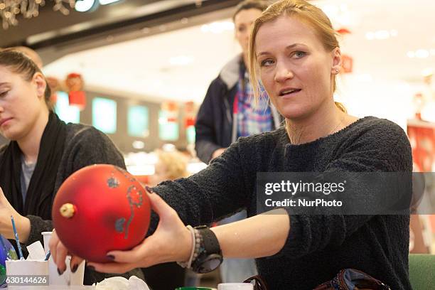 Multiple World and European champion in kick-boxing and boxing Iwona Guzowska takes part in the charity Christmas baubles painting in CH Klif...