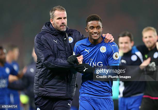 Demarai Gray of Leicester City with assistant manager Mike Stowell of Leicester City after the Premier League match between Stoke City and Leicester...