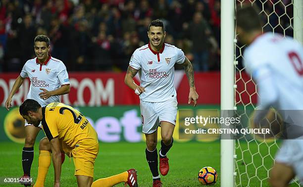 Sevilla's midfielder Vitolo celebrates after scoring a goal during the Spanish league football match Sevilla FC vs Malaga CF at the Ramon Sanchez...