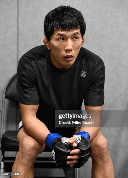 Takeya Mizugaki of Japan warms up backstage during the UFC Fight Night event inside the Golden 1 Center Arena on December 17, 2016 in Sacramento,...