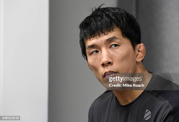 Takeya Mizugaki of Japan warms up backstage during the UFC Fight Night event inside the Golden 1 Center Arena on December 17, 2016 in Sacramento,...